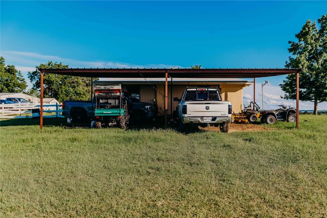 View of outdoor structure with a carport | Image 33