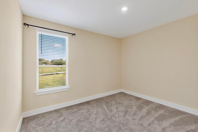 Spare room featuring carpet and recessed lighting | Image 21