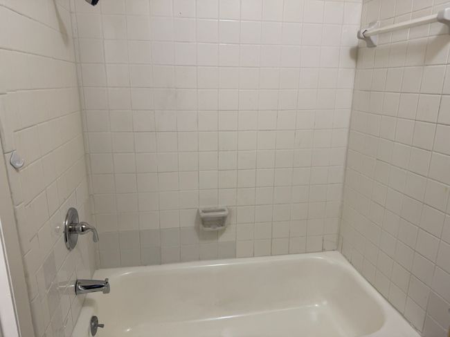 Bathroom featuring shower / tub combination | Image 15