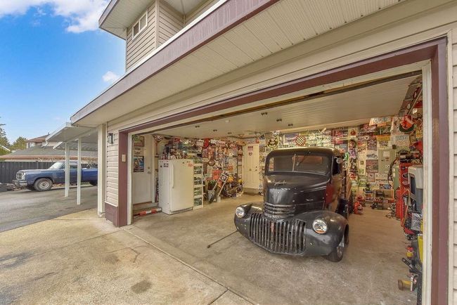 Garage with driveway | Image 13