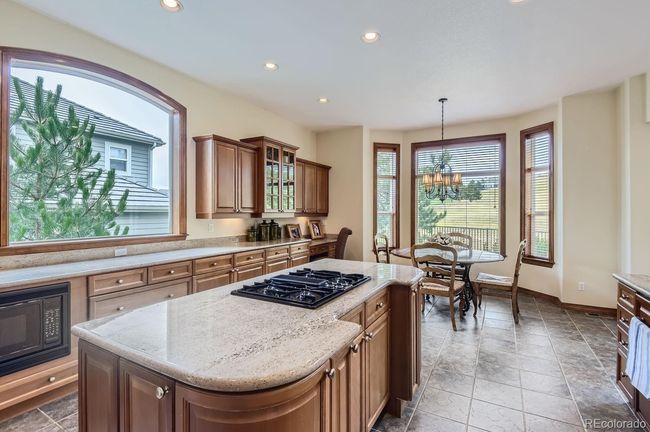 Massive kitchen island with gas cooktop! | Image 21