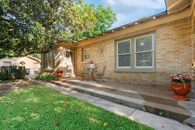 View of exterior entry featuring brick siding | Image 26