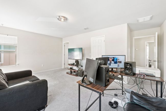 Primary bedroom currently used as an office. | Image 13