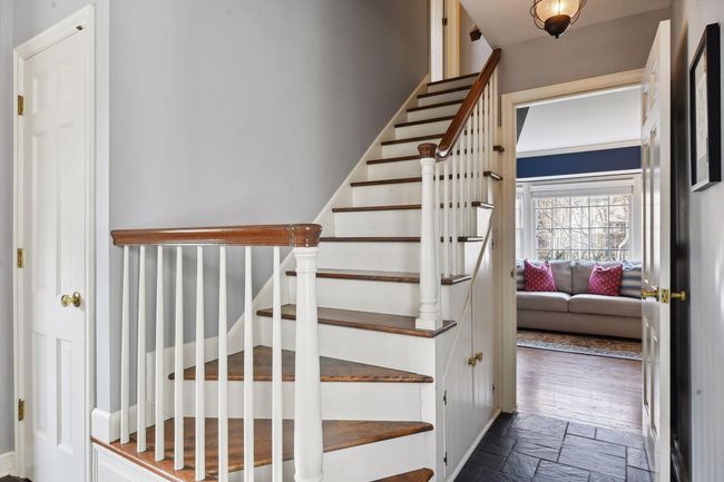Open staircase in foyer area and coat closet | Image 17