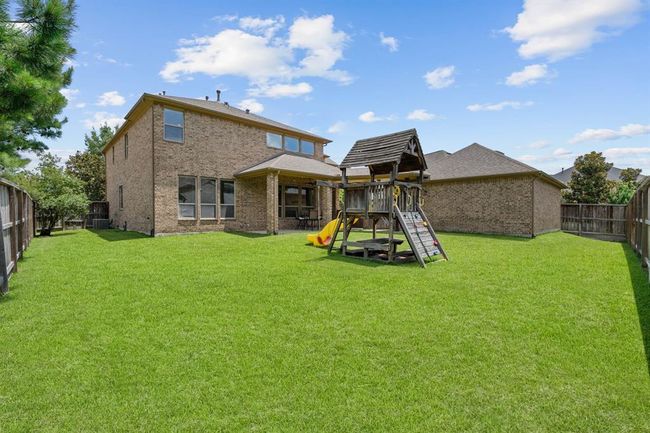 A fantastic sized lot for a future pool and still have plenty of yard. | Image 39