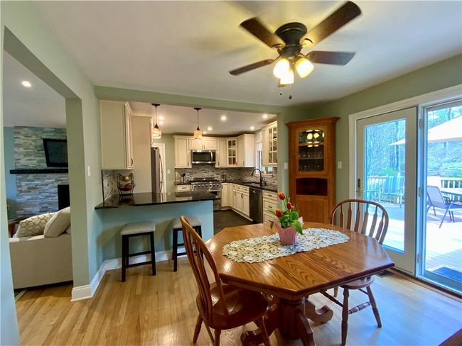 Large deck off the dining area. | Image 8
