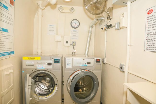 Laundry room featuring washer and dryer | Image 13