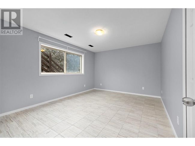 1503 Tanemura Cres, House other with 6 bedrooms, 4 bathrooms and 4 parking in Kelowna BC | Image 31