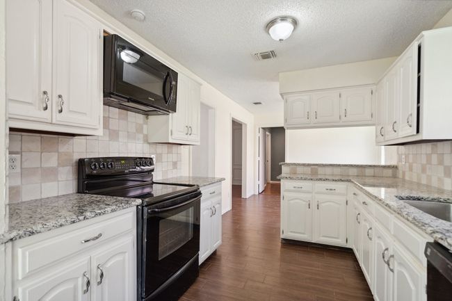 710 Cimarron Trl, House other with 3 bedrooms, 2 bathrooms and null parking in Irving TX | Image 6