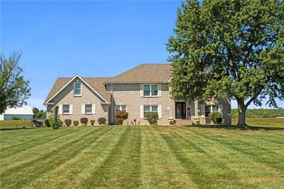 View of front of home featuring a front lawn | Image 1