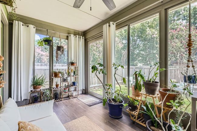 Sunroom / solarium with wood finished floors | Image 24