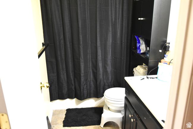 Bathroom featuring toilet and vanity | Image 7