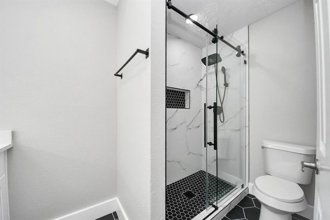 Standup shower in secondary bathroom | Image 20