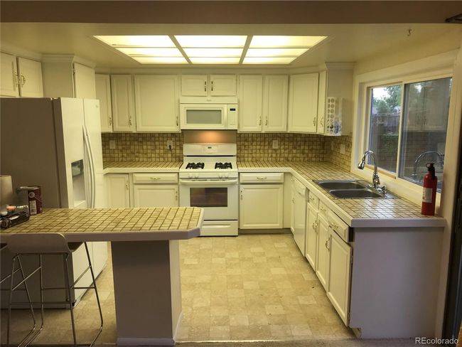 12657 E Bates Cir, House other with 4 bedrooms, 3 bathrooms and 2 parking in Aurora CO | Image 6