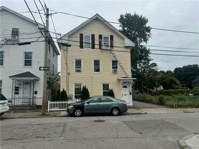 19 Melton Street, Home with 9 bedrooms, 3 bathrooms and null parking in Pawtucket RI | Image 1