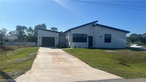 714 Chambers St E, LEHIGH ACRES, FL, 33974-9595 | Card Image
