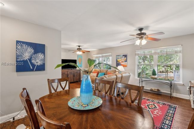 Spacious dining area, hardwood floors, and stylish built in shelving adds characters and richness. | Image 30