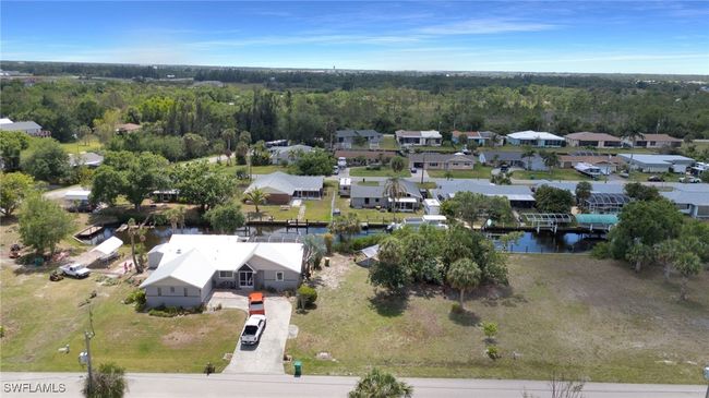 Bird's eye view featuring a residential view, a wooded view, and a water view | Image 4