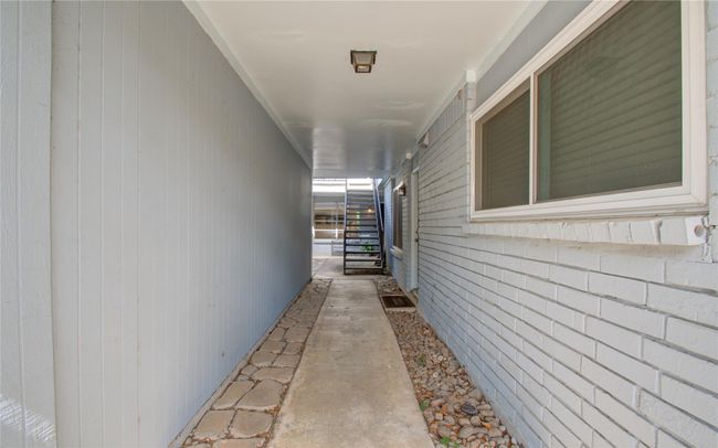 Condo is located in the back of the community in a corner | Image 17