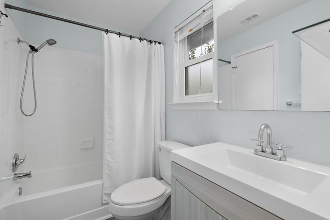 Full bathroom featuring vanity and shower / tub combo | Image 24