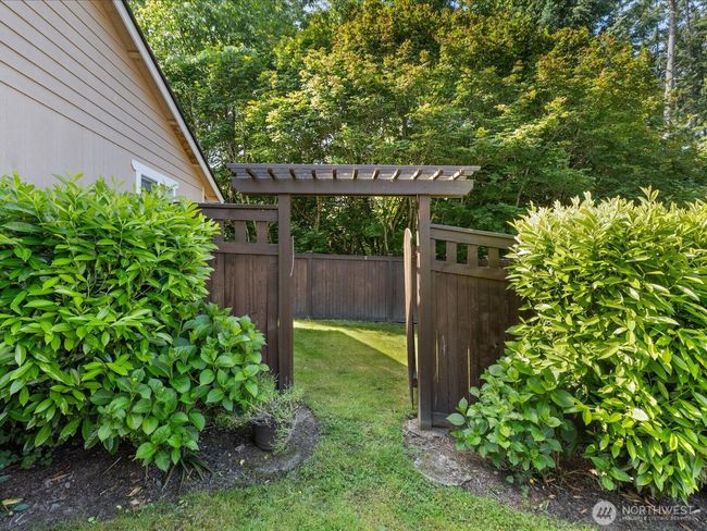 Right side of the house leading to private back yard | Image 31