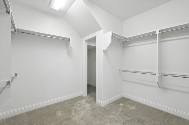 Walk in closet featuring carpet floors | Image 21