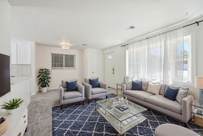 Spacious living room. New carpet throughout entire home. | Image 3