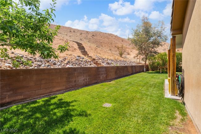 View of yard with a mountain view | Image 41