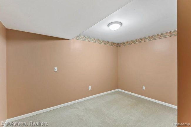 Downstairs bedroom with no egress window | Image 23