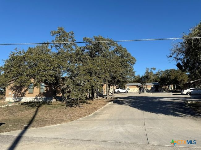 Entrance view of apartment property. | Image 40
