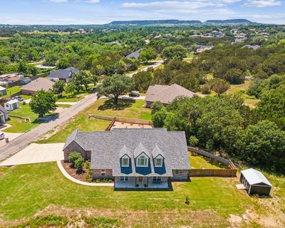 4012 Iron Horse Tr, House other with 3 bedrooms, 3 bathrooms and 2 parking in Granbury TX | Image 2