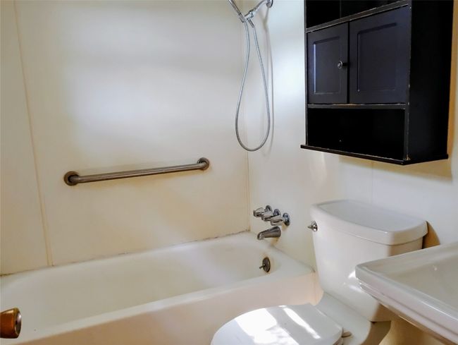 Bathtub and shower. | Image 13