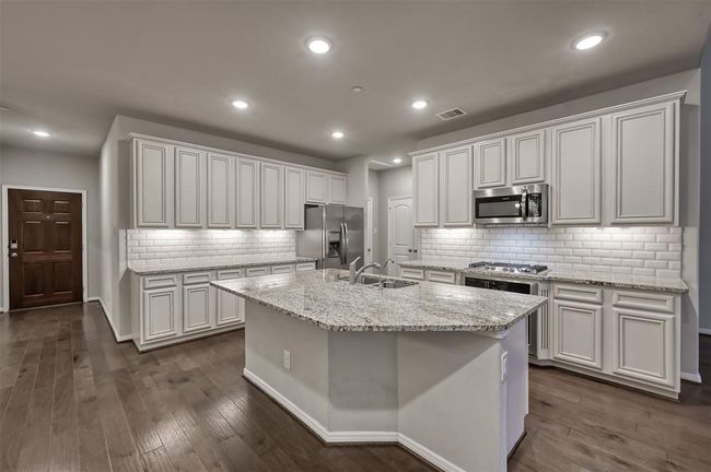 42 inch cabinets, huge island and offer plenty of space for any chef's needs | Image 6