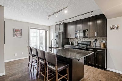 610 Cranford Crt Se, Townhouse with 2 bedrooms, 2 bathrooms and 2 parking in Calgary AB | Image 1