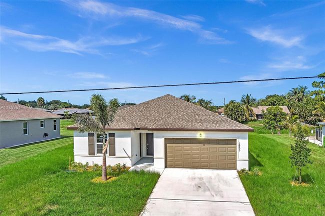 2033 Sw Castinet Ln, House other with 4 bedrooms, 3 bathrooms and null parking in Port St. Lucie FL | Image 45