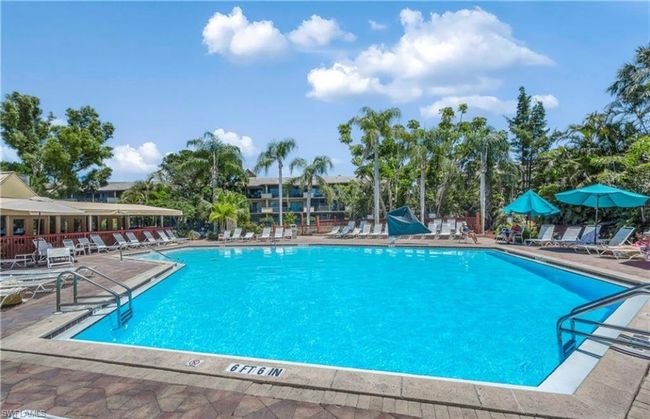 Pool featuring a patio area | Image 31