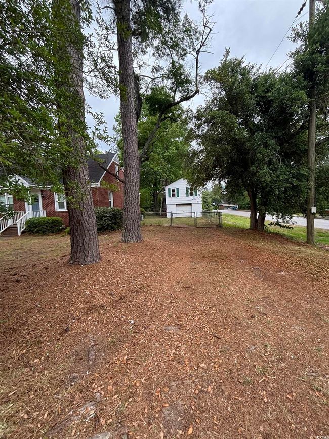 View of yard featuring fence | Image 8