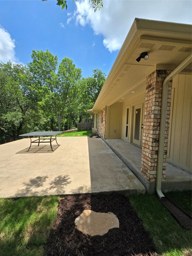 View of yard featuring a patio area | Image 19