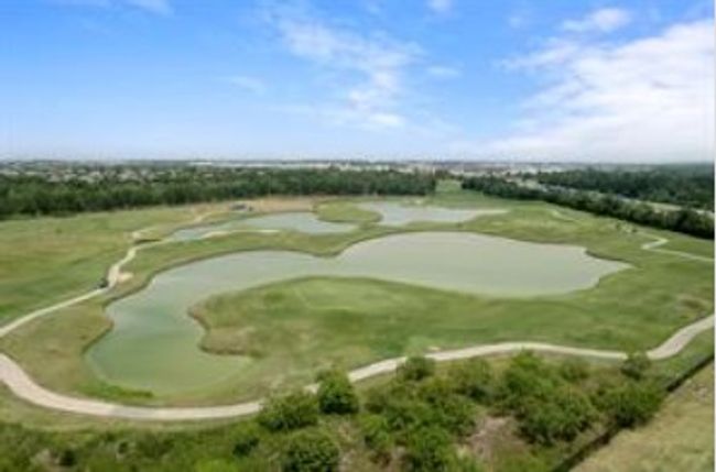 Aerial overview of property's location featuring a golf course | Image 36