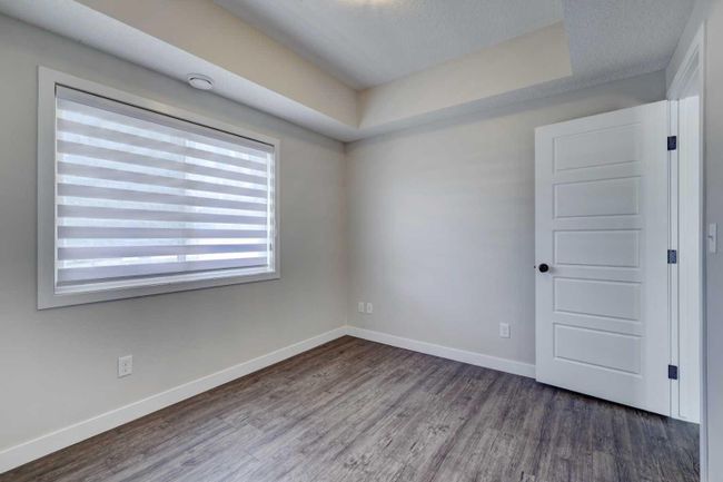 1411 - 2461 Baysprings Link Sw, Home with 2 bedrooms, 1 bathrooms and 1 parking in Airdrie AB | Image 19