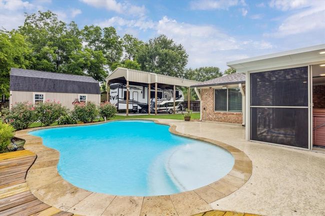 Outdoor in ground pool w/deck | Image 25