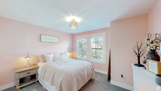 Bedroom featuring carpet and baseboards | Image 19