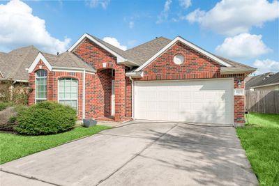 18922 Pinewood Point Lane, House other with 3 bedrooms, 2 bathrooms and null parking in Tomball TX | Image 2