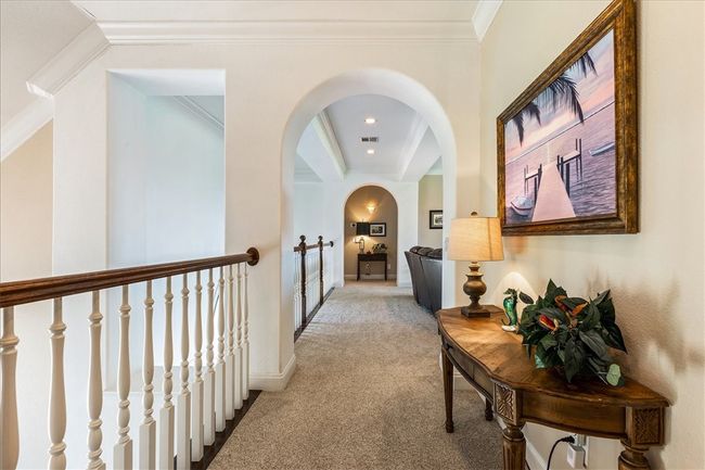 Upper level open hallway | Image 29