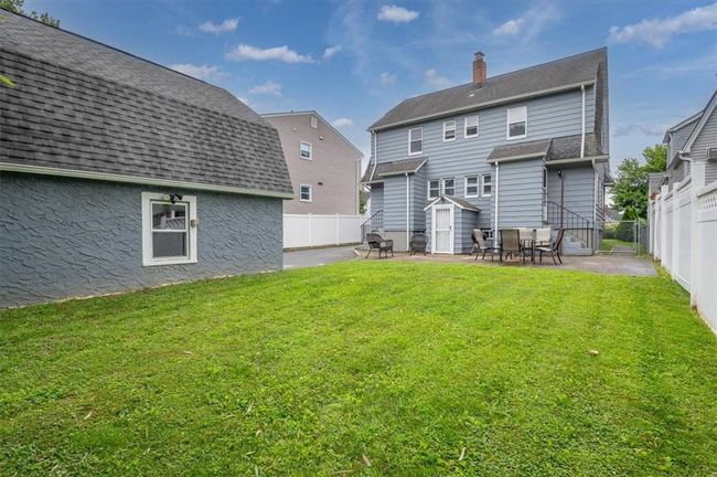Back of property featuring a lawn and a patio | Image 5