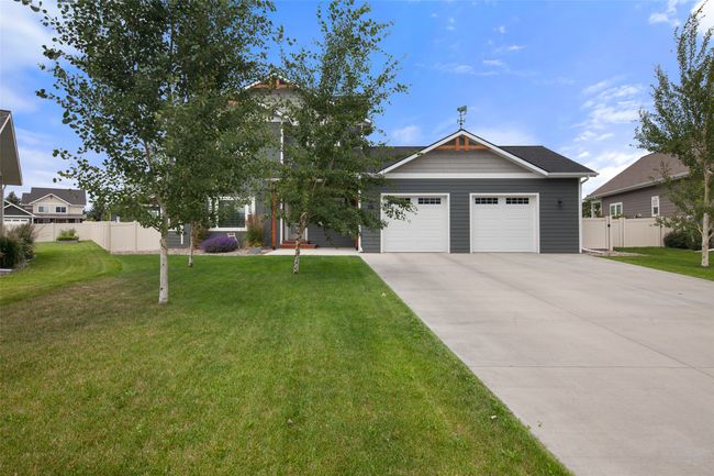 Well kept landscape & U.G. sprinklers. | Image 51