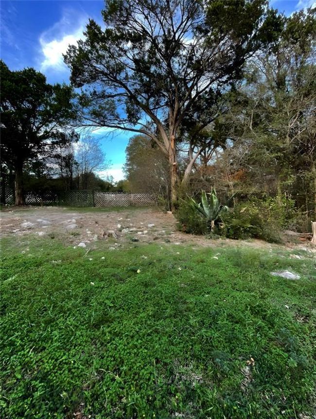 View of yard featuring fence | Image 11