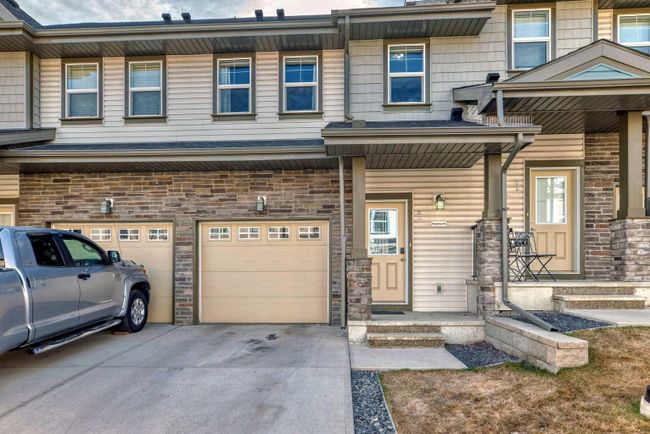 83 Panatella Hill Nw, Home with 3 bedrooms, 2 bathrooms and 2 parking in Calgary AB | Image 2
