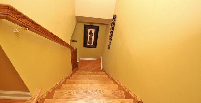 Stairs facing down from second floor | Image 28