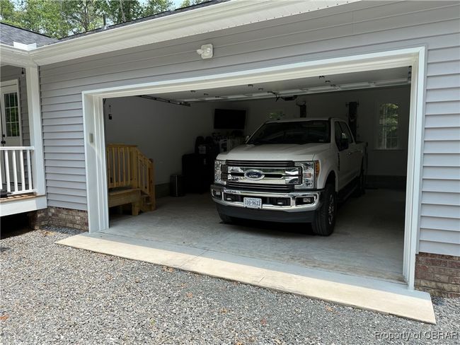 Attached Garage 23'x24' with gravel driveway | Image 12